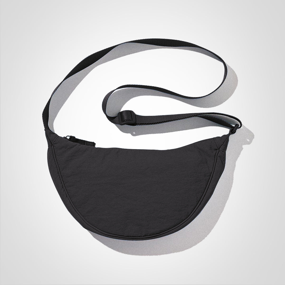 Sac à bandoulière unisexe en nylon durable, parfait pour les voyages et le quotidien actif.