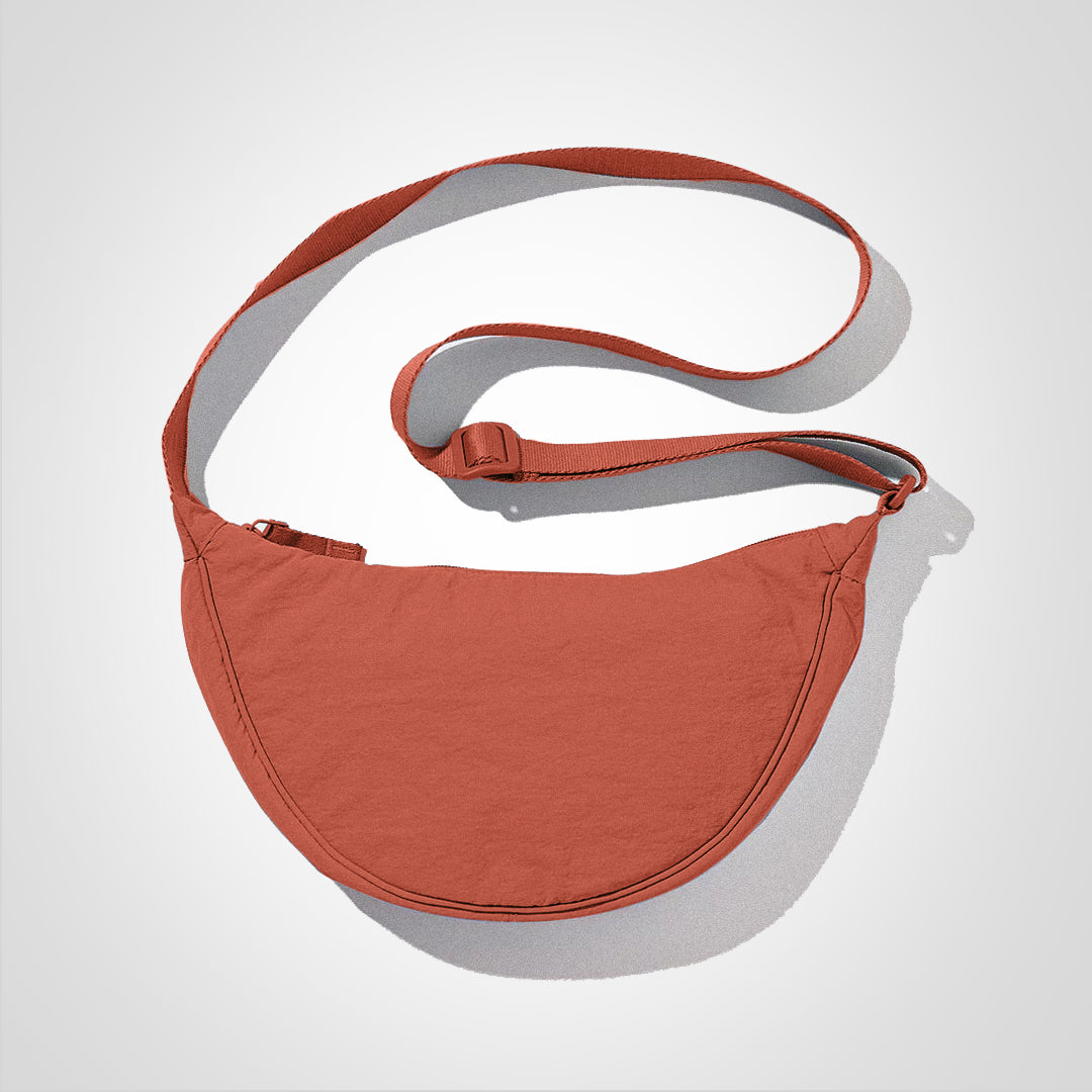 Sac à bandoulière unisexe décontracté en nylon pour voyage et usage quotidien, style moderne.