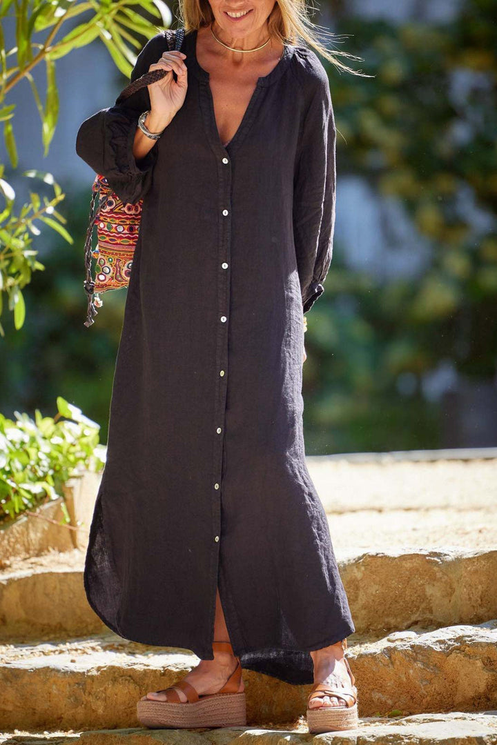 Robe midi chic et boutonnée, col V, manches longues, un essentiel de la garde-robe féminine moderne.