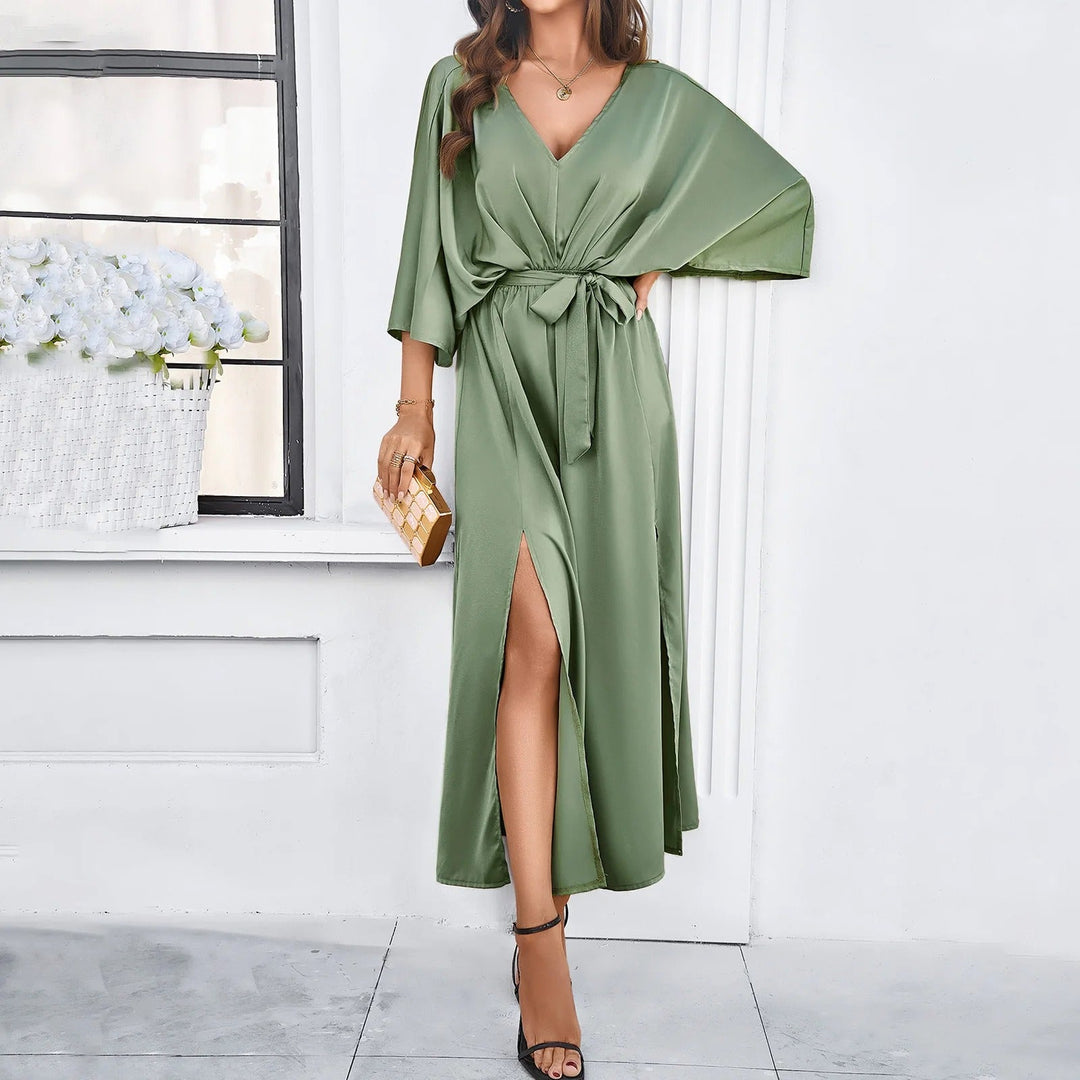 Robe fluide longue femme élégante avec col en V et manches amples, parfaite pour l'été et le printemps.