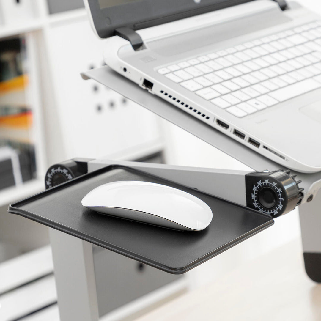 Support ergonomique pour ordinateur portable, améliore la productivité et le confort en télétravail.