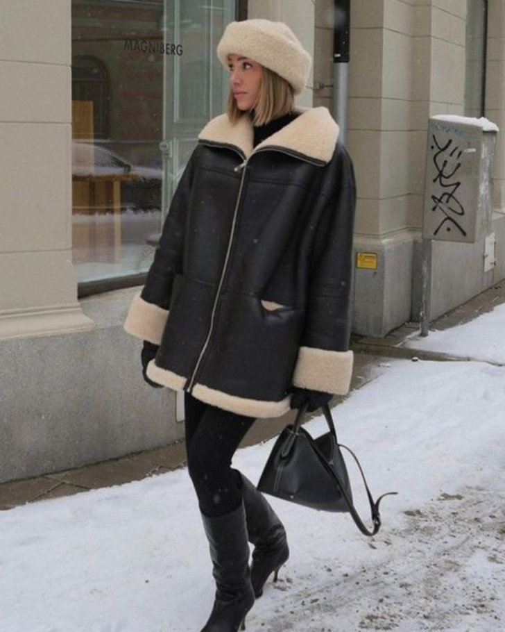 Blouson en cuir femme chaud et confortable, coupe oversize pour une élégance quotidienne en automne.