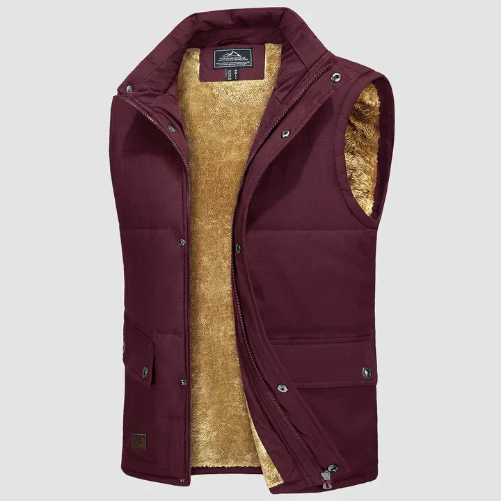 Bodywarmer urbain homme, look moderne, gris anthracite, idéal pour un style décontracté quotidien.