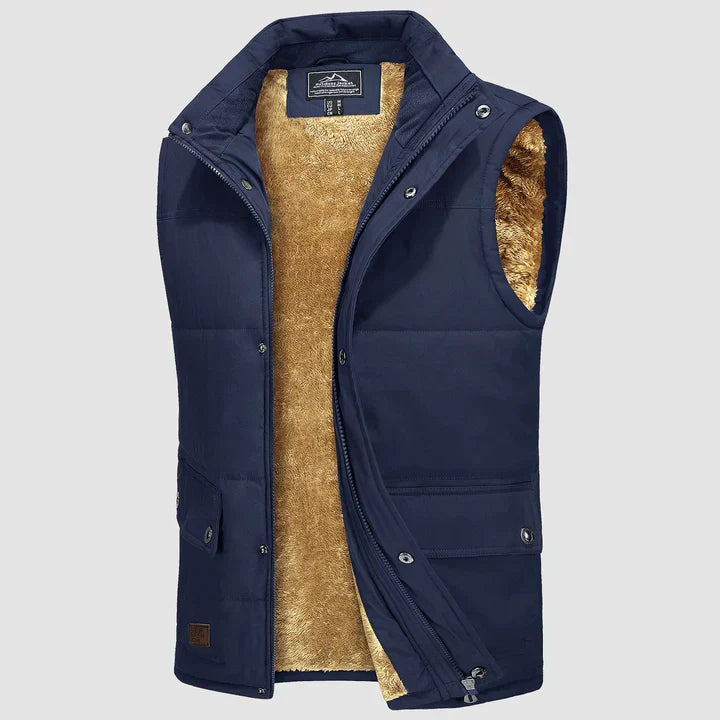 Bodywarmer de voyage homme, compressible et léger, bleu, essentiel pour les aventures hivernales.