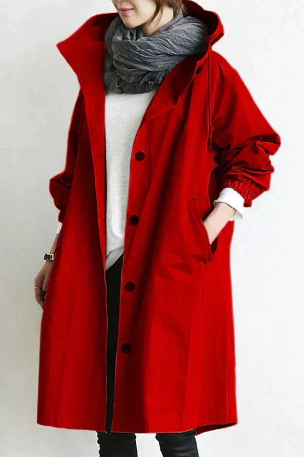 Manteau de pluie Elizabeth, essentiel pour l'automne. Vêtement femme chic et protecteur, parfait pour la ville.