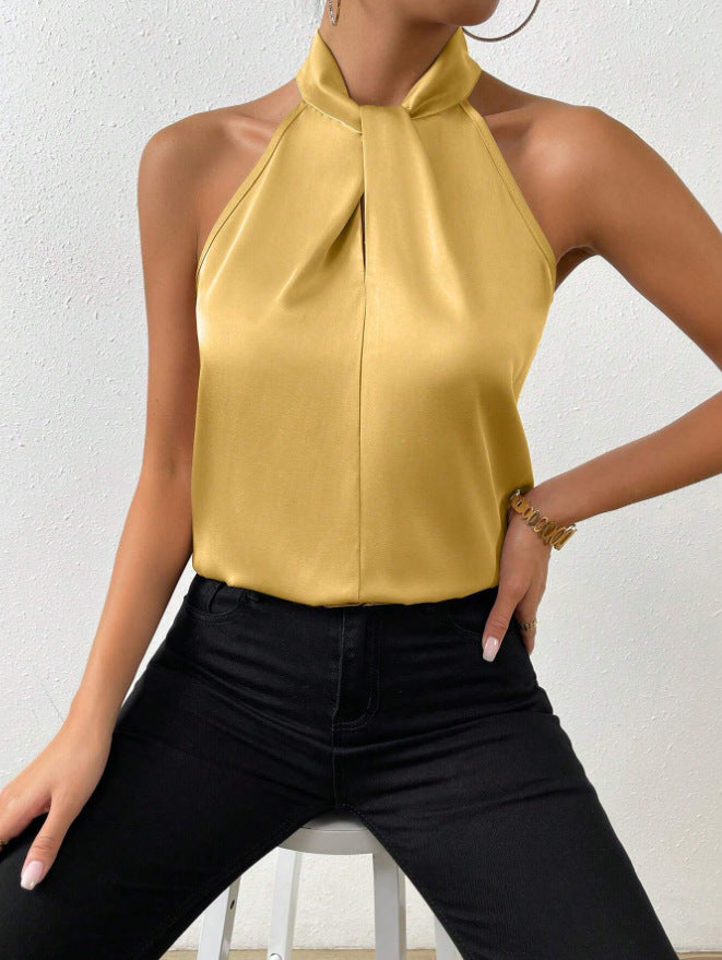 Blouse femme col halter avec nœud, tenue de soirée ou look décontracté.
