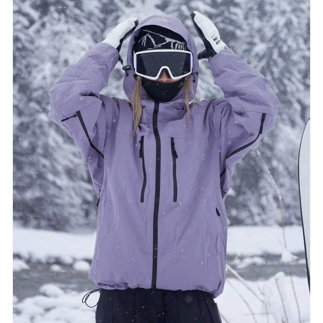 Veste d'hiver unisexe isolante avec capuche pour ski et snowboard. Chaleur et protection garanties.