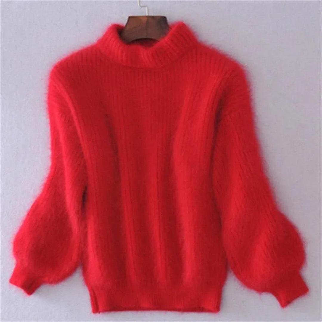 Ce pull femme à col montant et manches bouffantes est parfait pour la saison froide. Élégant, chaud et confortable.