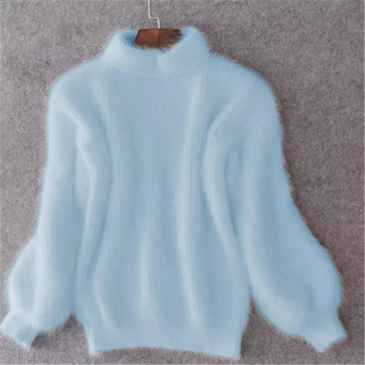 Pull femme tricoté confortable, col montant élégant et manches bouffantes. Idéal pour l'hiver et la saison froide.