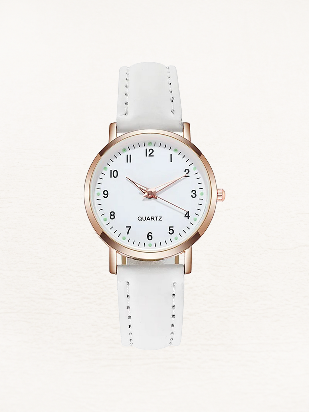 Montre femme quartz élégante, bracelet cuir or rose, cadran minimaliste. Accessoire mode féminine chic.