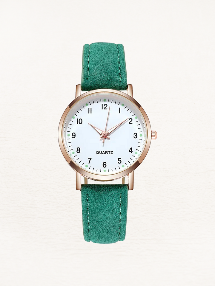Montre femme chic à quartz, bracelet en cuir véritable or rose. L'élégance intemporelle au poignet.
