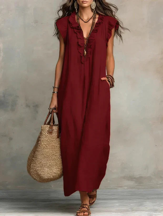 Tendance: robe longue bohème femme en lin coton avec volants et poches, look d'été.