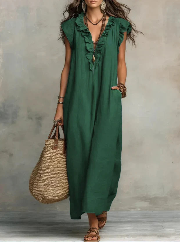 Robe maxi femme en lin coton, coupe fluide, style bohème et détails volants.