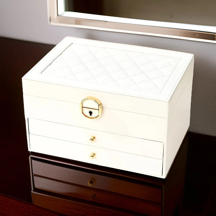 Élégante boîte à bijoux en cuir multi-niveaux, organisation de luxe pour tous vos accessoires et bijoux.