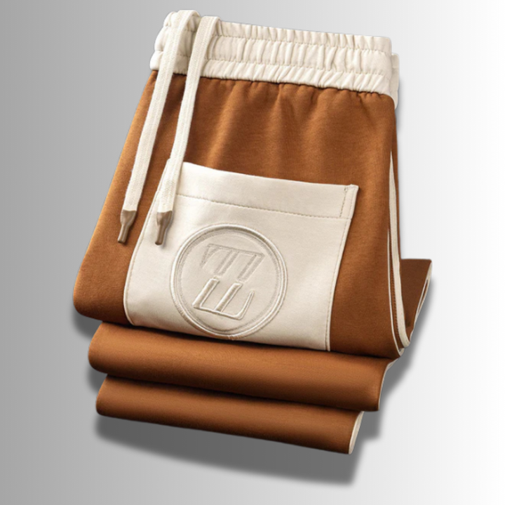 Jogging homme pour un confort optimal, look sport décontracté. Idéal comme tenue élégante de loisirs.