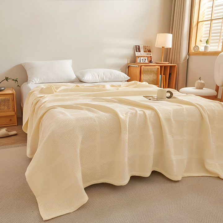 Plaid hypoallergénique en coton doux, motif vichy, parfait pour enfants et adultes.