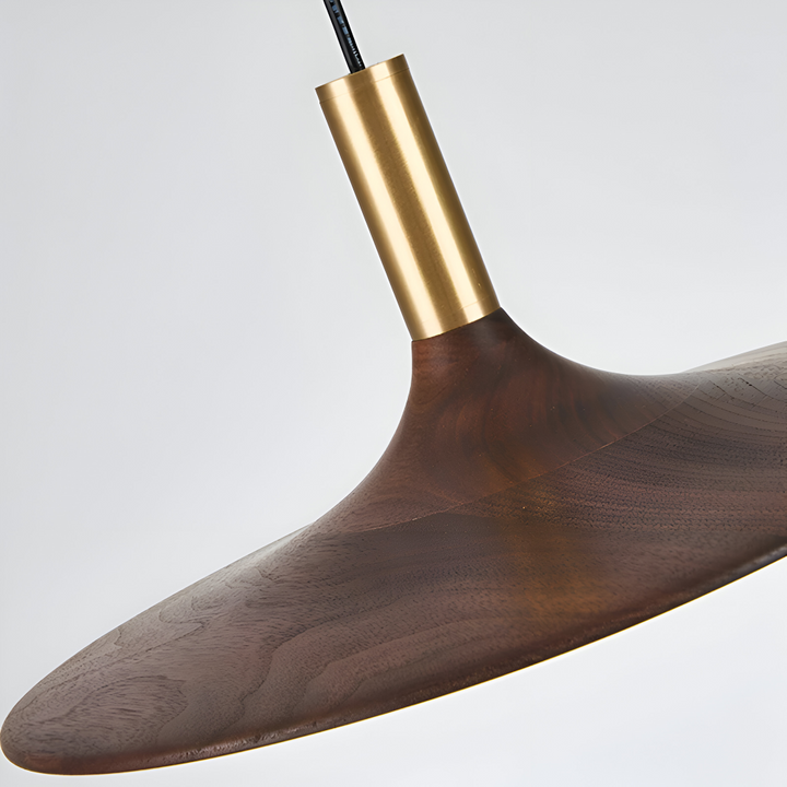 Suspension LED ronde pour cuisine moderne, design scandinave, lumière chaleureuse.