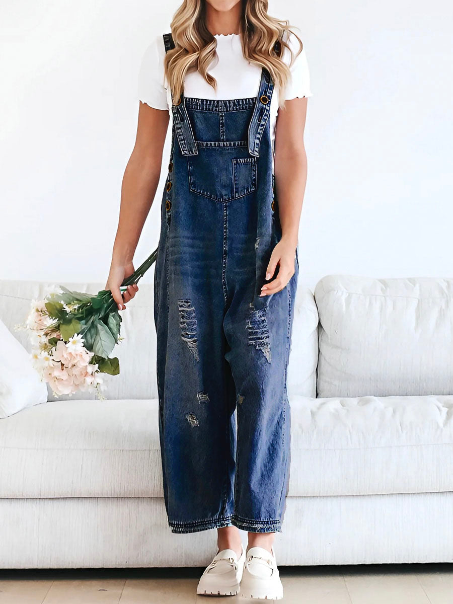 Salopette jean femme décontractée oversize, coupe ample, jambes larges, style casual et très confortable.