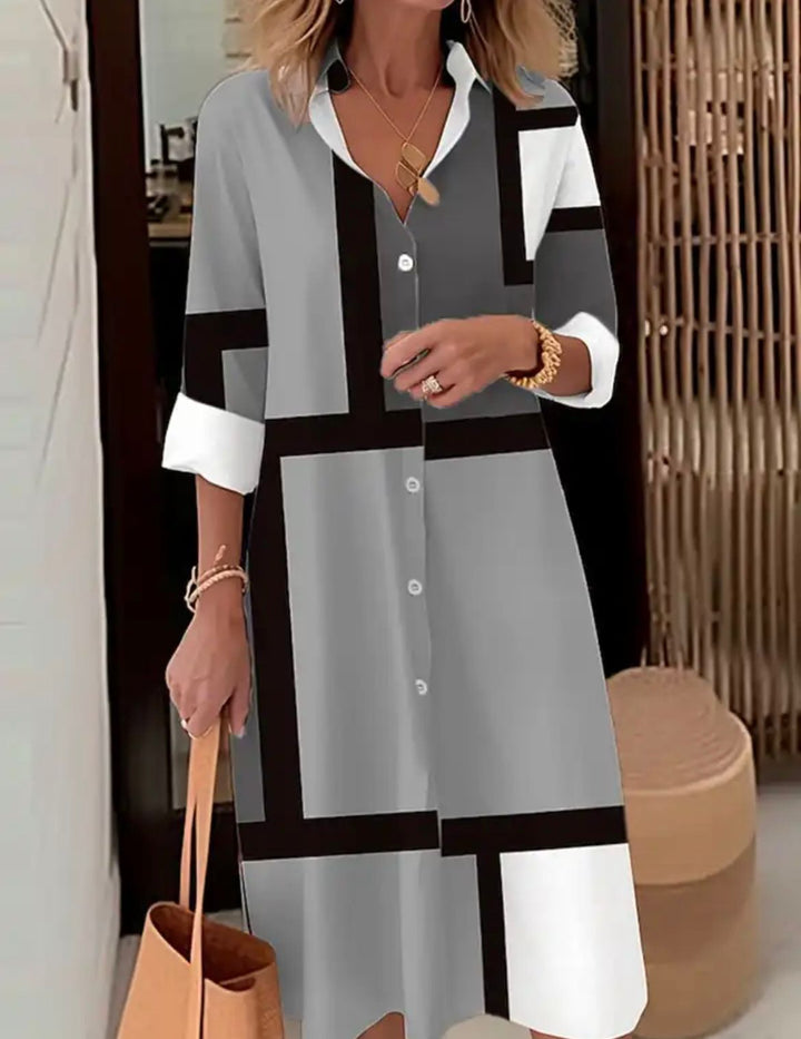 Robe chemise femme à motifs géométriques, coupe fluide. Idéale pour le bureau, élégante et confortable.