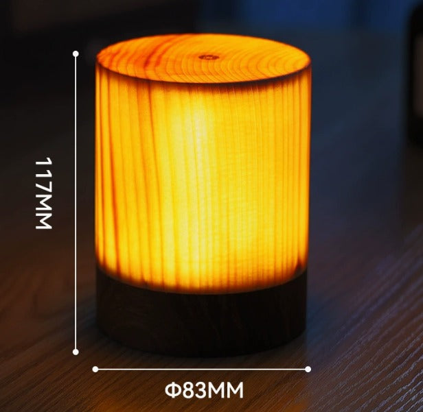 Décoration lumineuse: lampe de table LED tactile sans fil, rechargeable, avec un design en bois épuré.