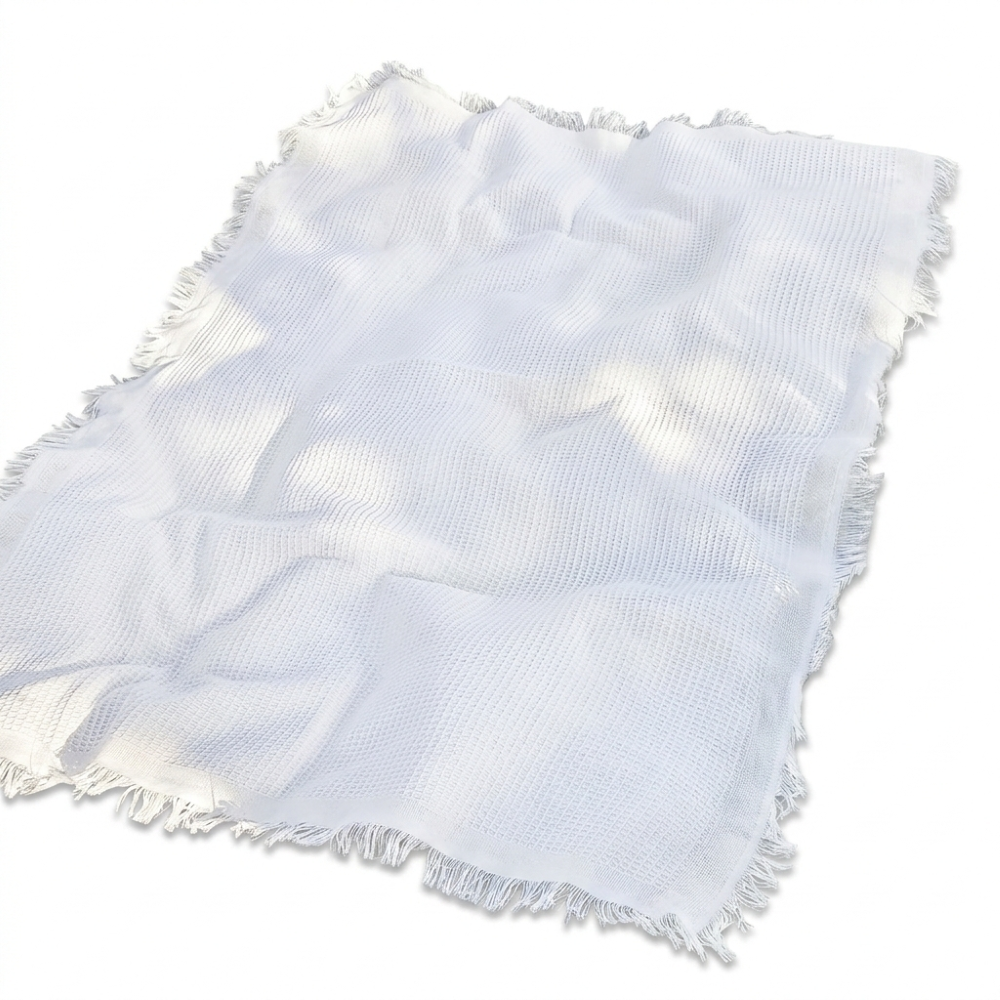 Couverture de pique-nique blanche bohème lavable avec pompons pour jardin et extérieur.