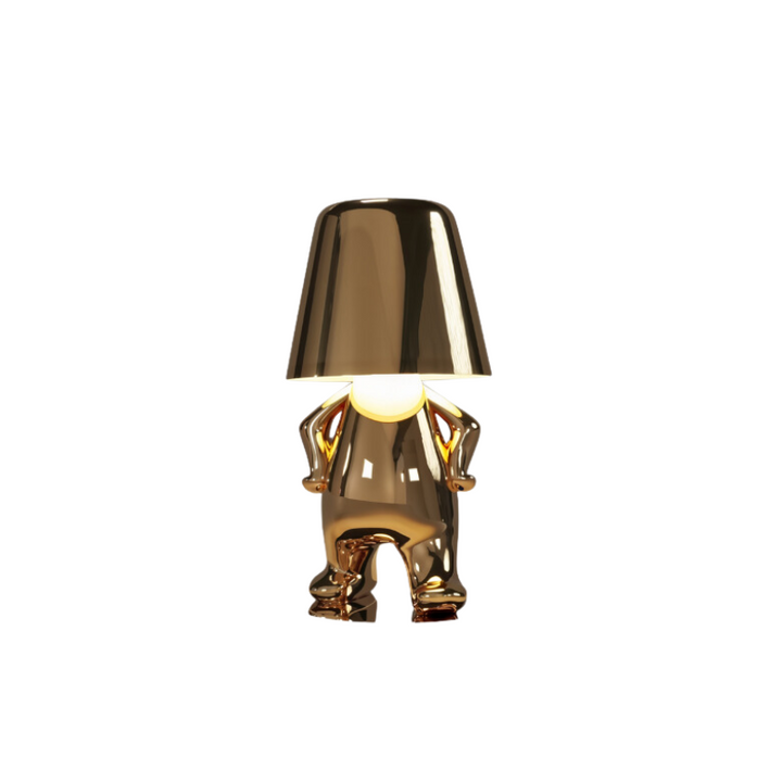 Lampe de bureau dorée "Le Penseur" sans fil, apporte une touche artistique et design à votre espace.