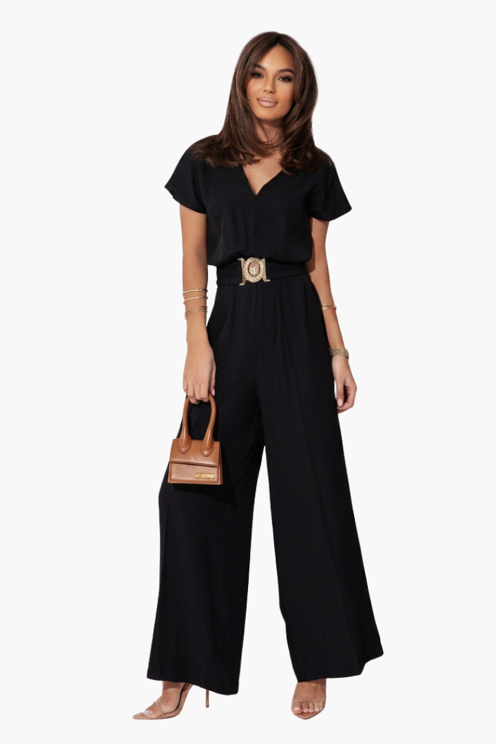 Combinaison pantalon femme mode, ample, avec ceinture bouclée ajustable. Style chic et polyvalent.