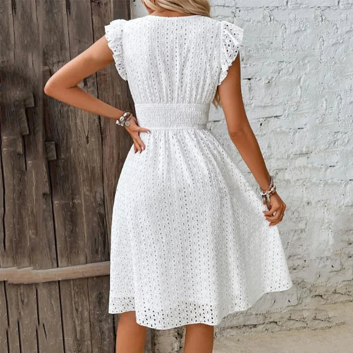 Robe midi chic pour femme, parfaite pour l'été, avec un col V et une coupe évasée bohème.