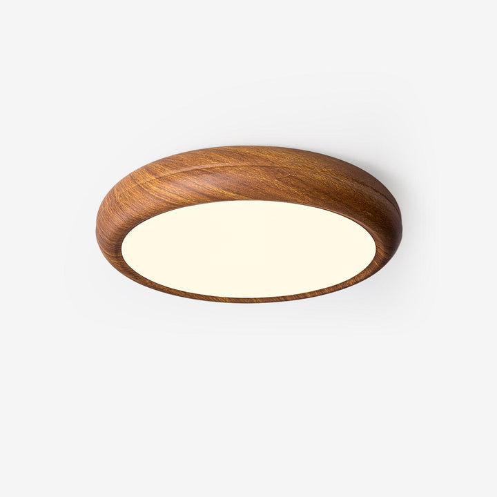 Plafonnier LED rond, crée une ambiance chaleureuse en bois.