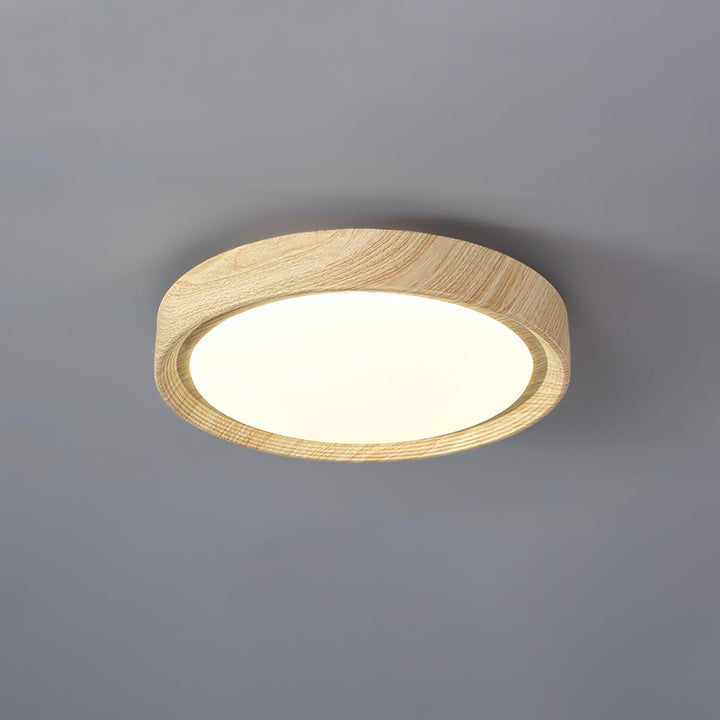 Lampe de plafond LED moderne, effet bois, éclairage chaleureux.