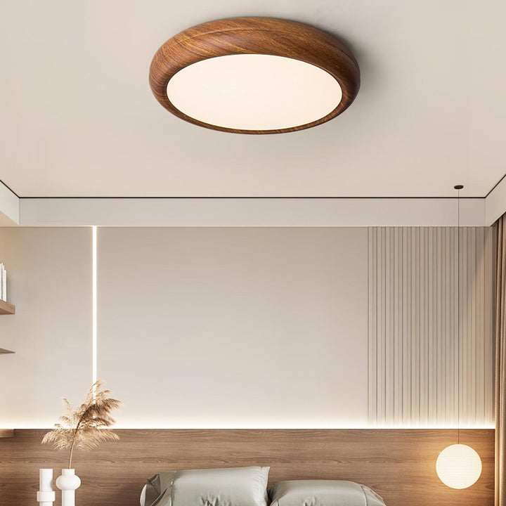 Luminaire LED rond avec finition bois, style nordique contemporain.