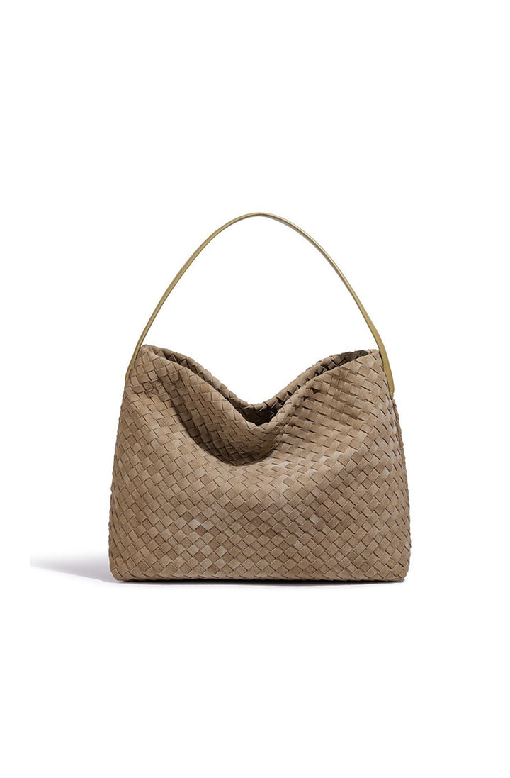 Sac tressé polyvalent pour femme, parfait comme accessoire quotidien ou comme sac de plage chic.