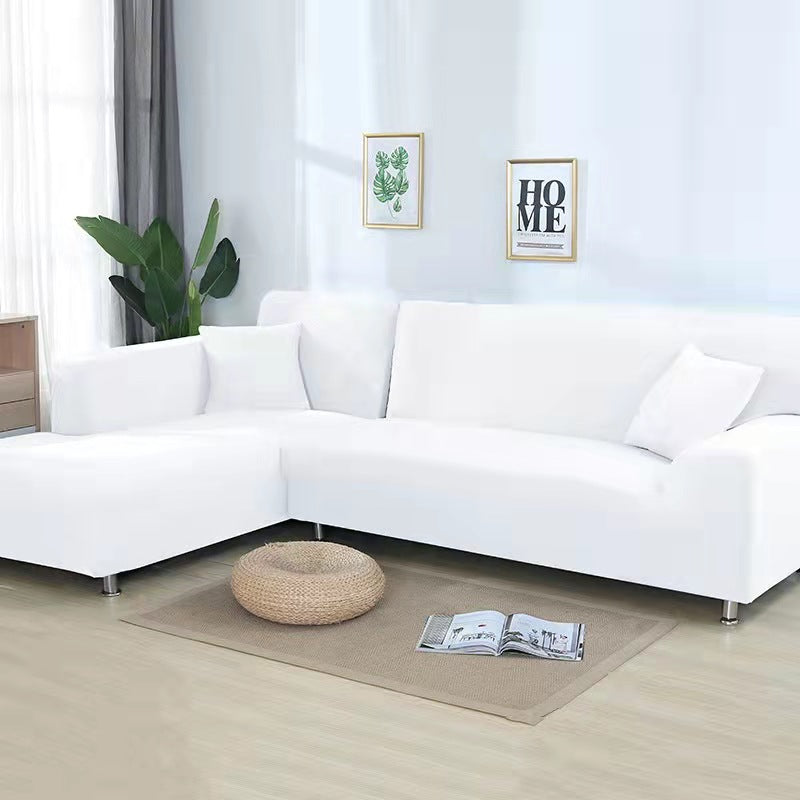 Housse canapé extensible pour décoration salon. Disponible en divers coloris, pour personnaliser votre ameublement.