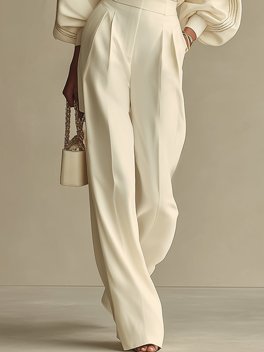 Ensemble tricot côtelé écru pour femme, matière douce et confortable. Un choix élégant pour la mode automne/hiver.