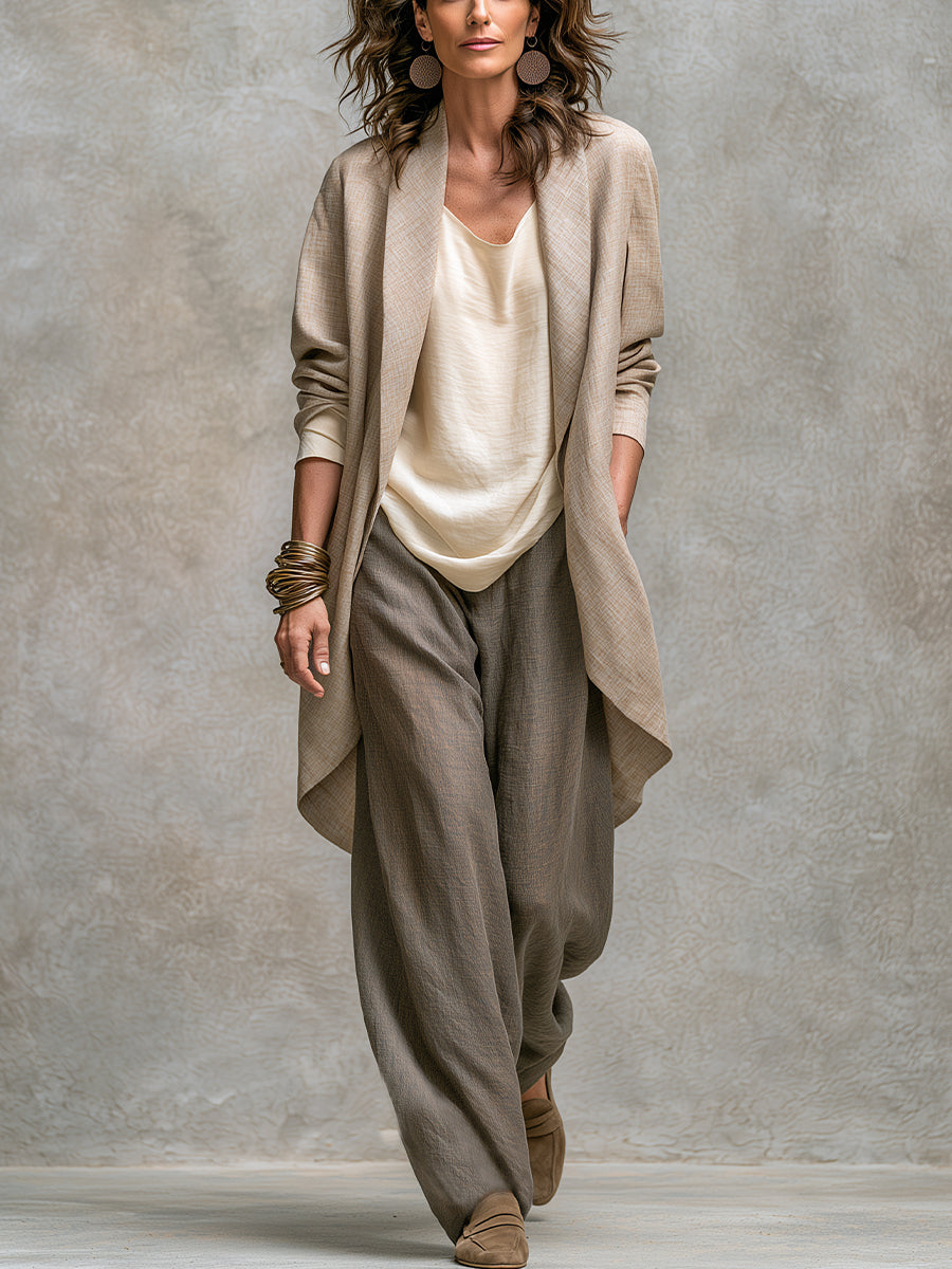 Ensemble femme 3 pièces élégant : veste, top, pantalon large. Style chic décontracté pour un look moderne.