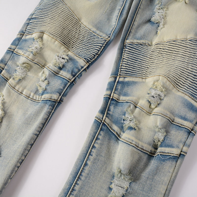 Pantalon jean homme skinny biker bleu clair, coupe ajustée, déchirures mode. Look urbain et stylé.