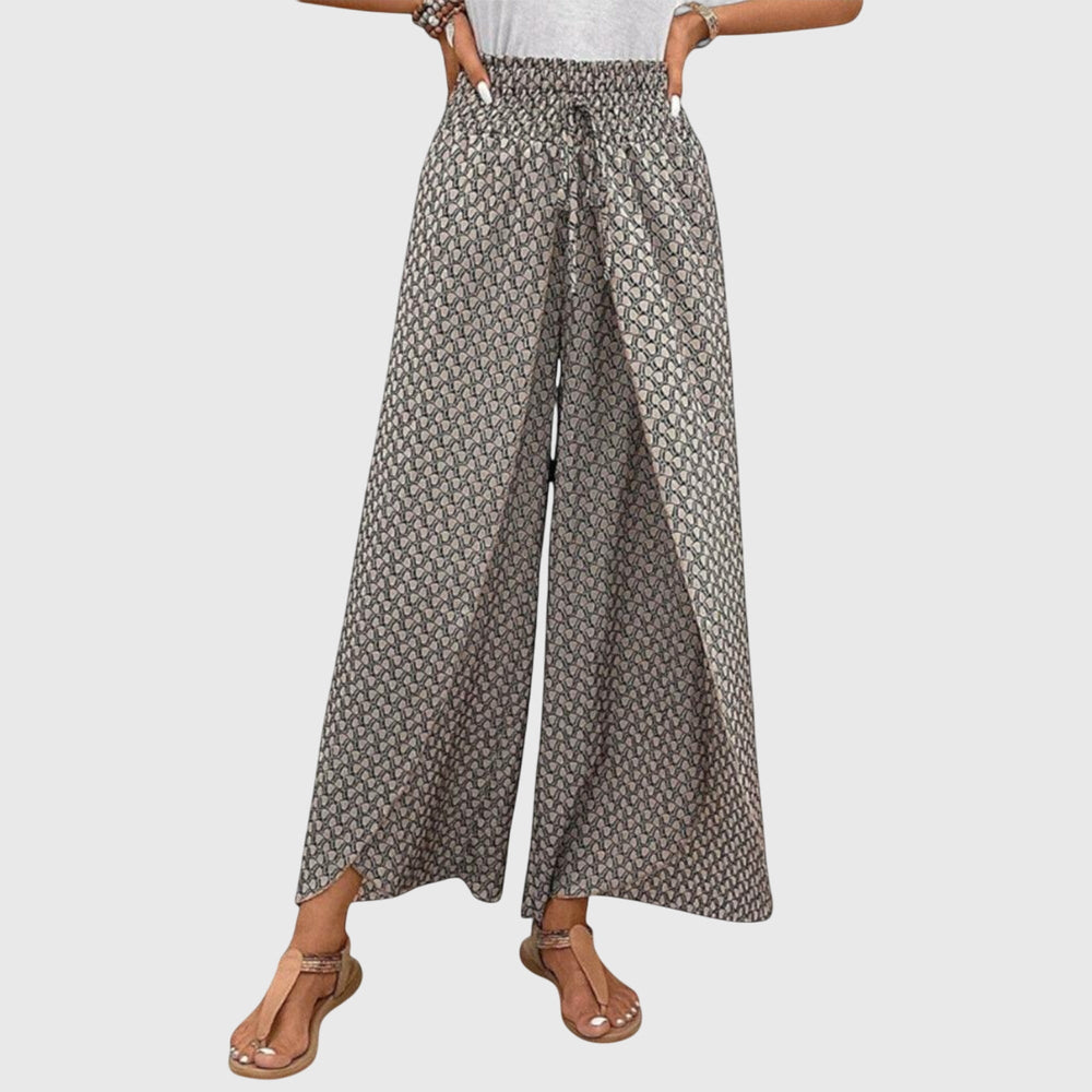 Pantalon palazzo femme confortable, tissu fluide, taille haute. Look moderne décontracté chic.
