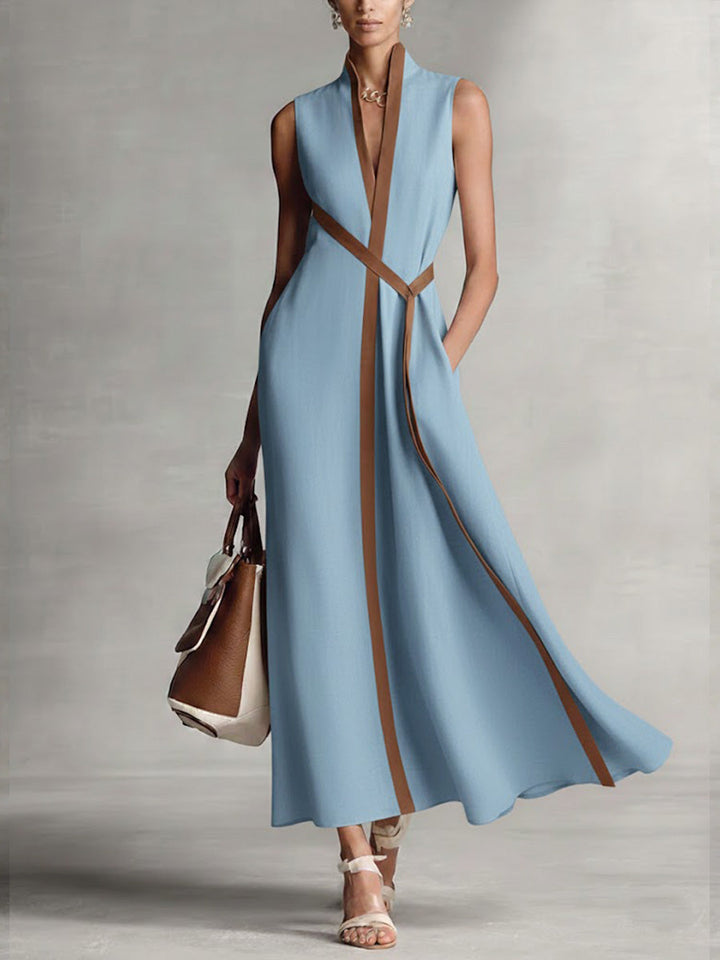 Robe femme fluide et confortable, coupe longue sans manches, style chic et polyvalent pour toute occasion.