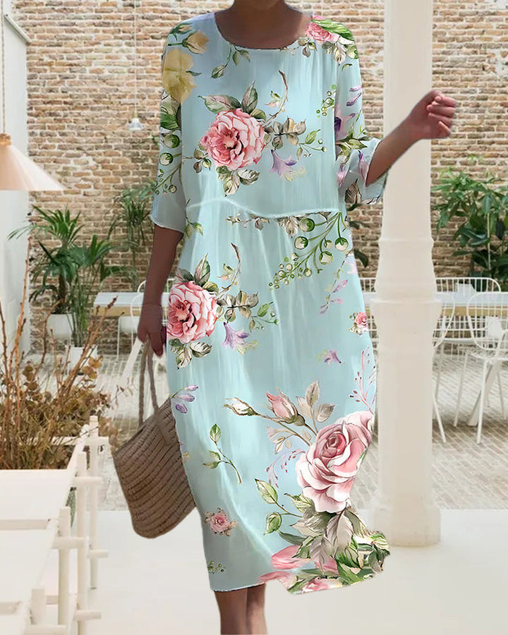 Motif floral éclatant sur robe mi-longue confortable pour femme. Idéale pour l'été, le printemps, allie chic et élégance.