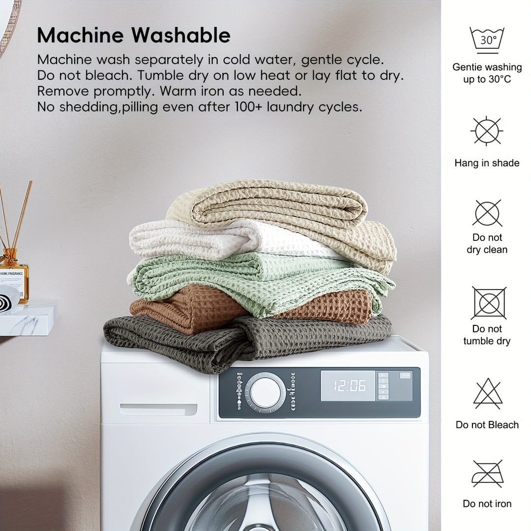 Plaid Cloudweave toute saison, doux et respirant, avec un motif gaufré stylé pour votre maison.