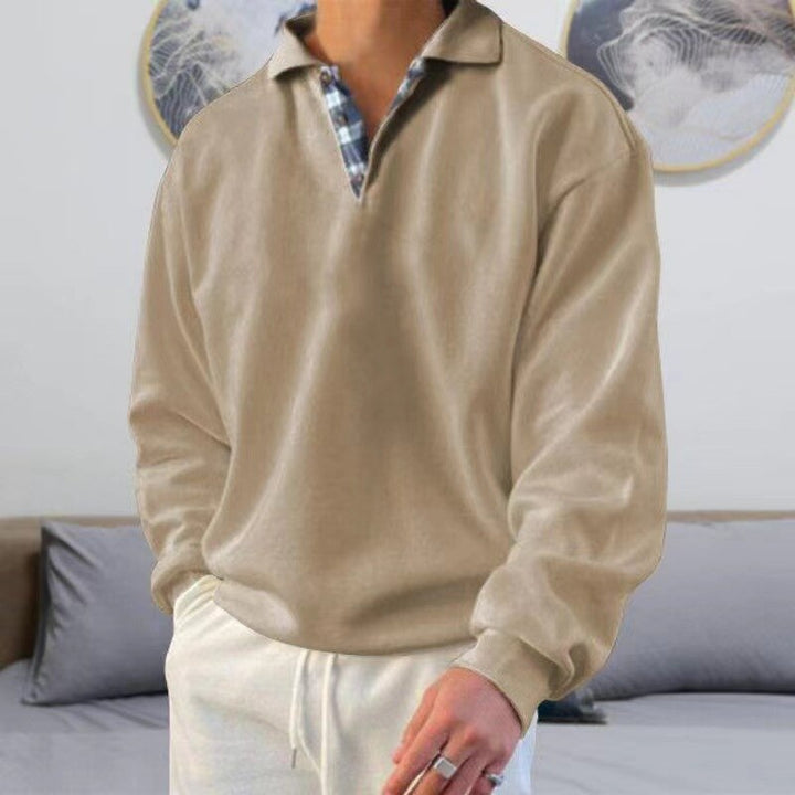 Pull homme élégant et confortable à manches longues, idéal pour un style décontracté moderne.