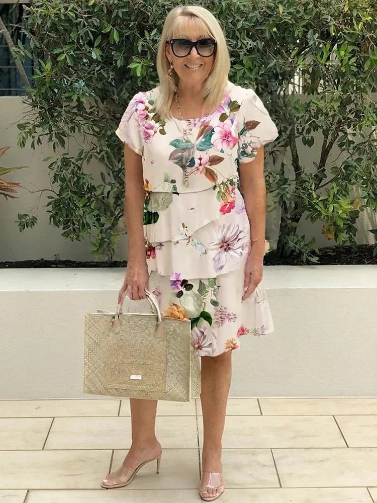 Robe florale femme élégante, idéale soirée/cocktail, coupe flatteuse pour printemps-été.