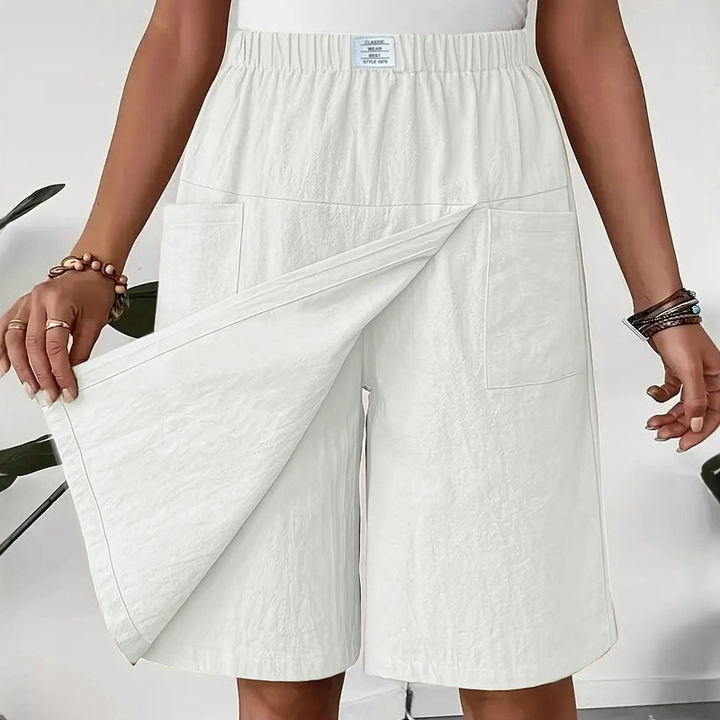 Short jupe asymétrique chic femme, parfait pour l'été, confortable et élégant.