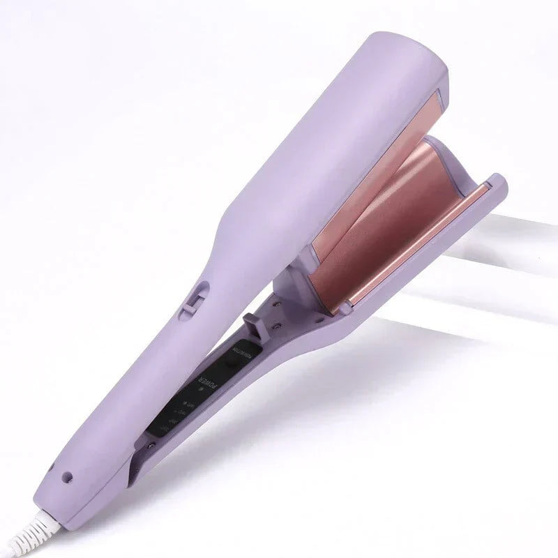 Fer à boucler automatique céramique pour tout type de cheveux, protège et crée des boucles sublimes.