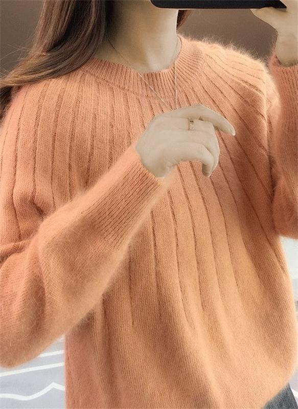 Chandail pull femme décontracté, maille douce et chaude. Idéal pour un look automne-hiver confortable et chic.