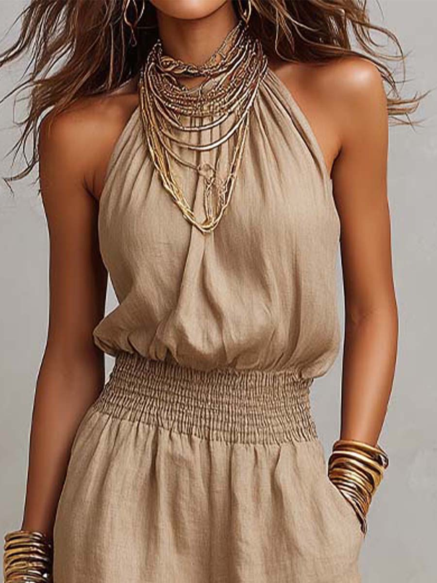 Silhouette élégante avec cette combinaison fluide femme halter à jambes larges. Confortable et chic.