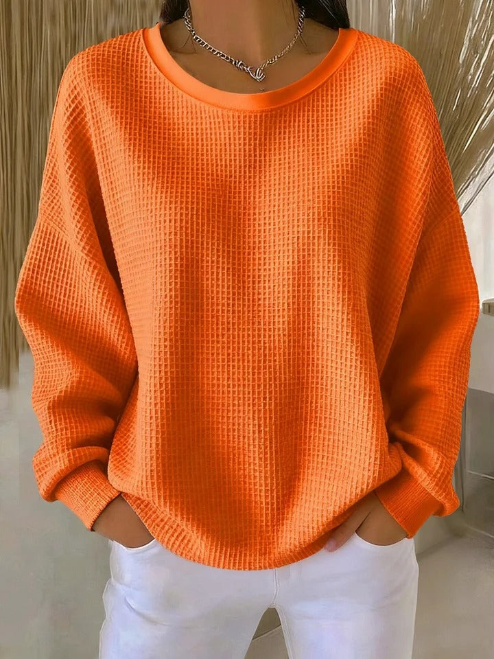 Sweat-shirt femme à texture douce, pour un confort quotidien et un style décontracté impeccable.