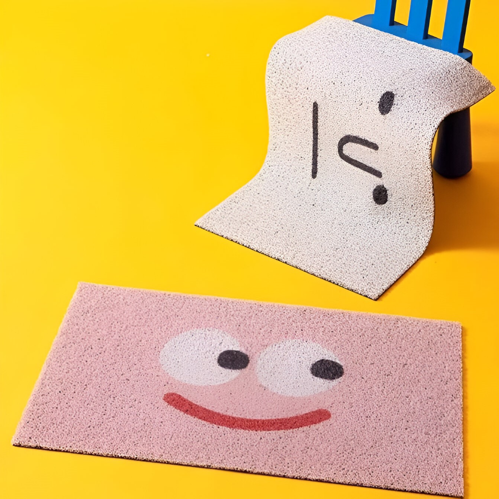 Tapis de porte souriant en PVC, très antidérapant, idéal pour maintenir un sol propre.
