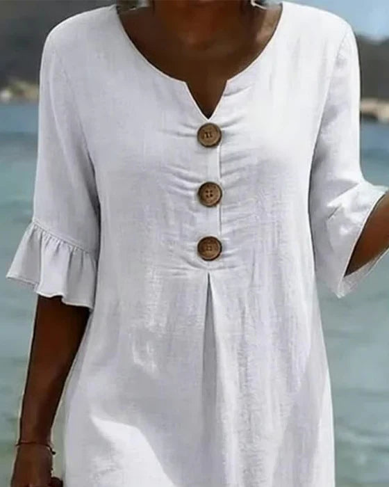 Robe légère femme en coton lin boutonnée, coupe décontractée. Manches volantées élégantes pour l'été.