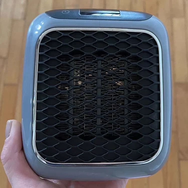 Petit chauffage électrique LuxuraHeat puissant et portable, parfait pour un chauffage d'appoint économique et sécurisé.